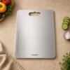 Amazon Brand – Solimo Regular Chopping Slicing, Kneading Board | Stainless Steel | Double Sided | Round Edge | for Vegetables, Fruits (L)